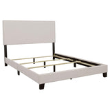 Boyd Queen Upholstered Bed With Nailhead Trim Ivory