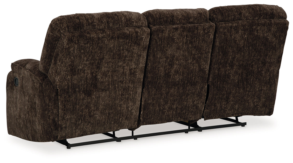 Soundwave Chocolate Reclining Sofa With Drop Down Table