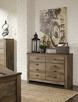 Trinell Queen Panel Headboard, Dresser, Mirror, Chest and Nightstand