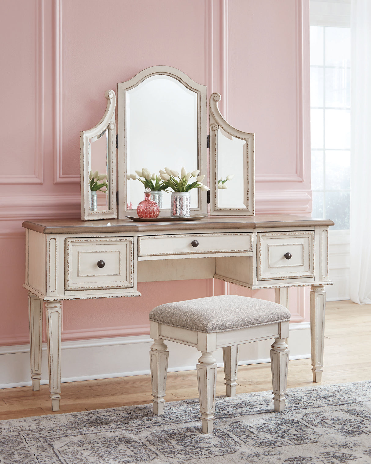 Realyn King Panel Bed, Dresser, Mirror, Chest, Vanity and Nightstand