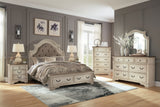 Realyn Queen Upholstered Panel Bed with Storage, Dresser and Nightstand