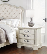 Arlendyne Antique White King Panel Bed, Dresser, Mirror, Chest And 2 Nightstands