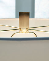 Teelsen Clear/Gold Finish Table Lamp