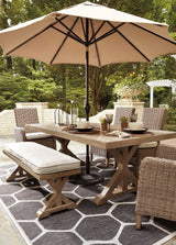 Beachcroft Beige Dining Table With Umbrella Option