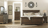 Flynnter Medium Brown Panel Bedroom Set