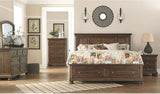 Flynnter Medium Brown Panel Storage Bedroom Set