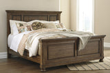 Flynnter Medium Brown Panel Bedroom Set