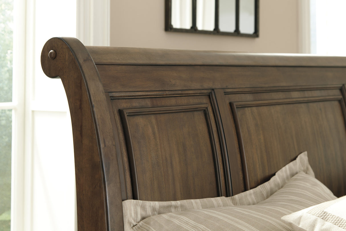 Flynnter Sleigh Bedroom Set In Medium Brown