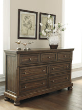 Flynnter Sleigh Bedroom Set In Medium Brown