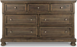 Flynnter Sleigh Bedroom Set In Medium Brown