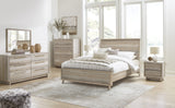 Hasbrick Tan Panel Bedroom Set with Footboard