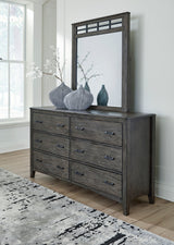 Montillan Panel Bedroom Set In Grayish Brown